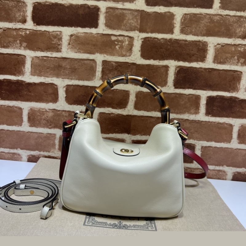 G*u*i top handle bags